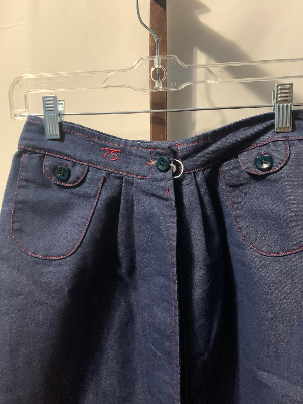 TShirterie navy blue cotton, polyester & tencel midi skirt with red stitching and button detail #midi #buttondetail
