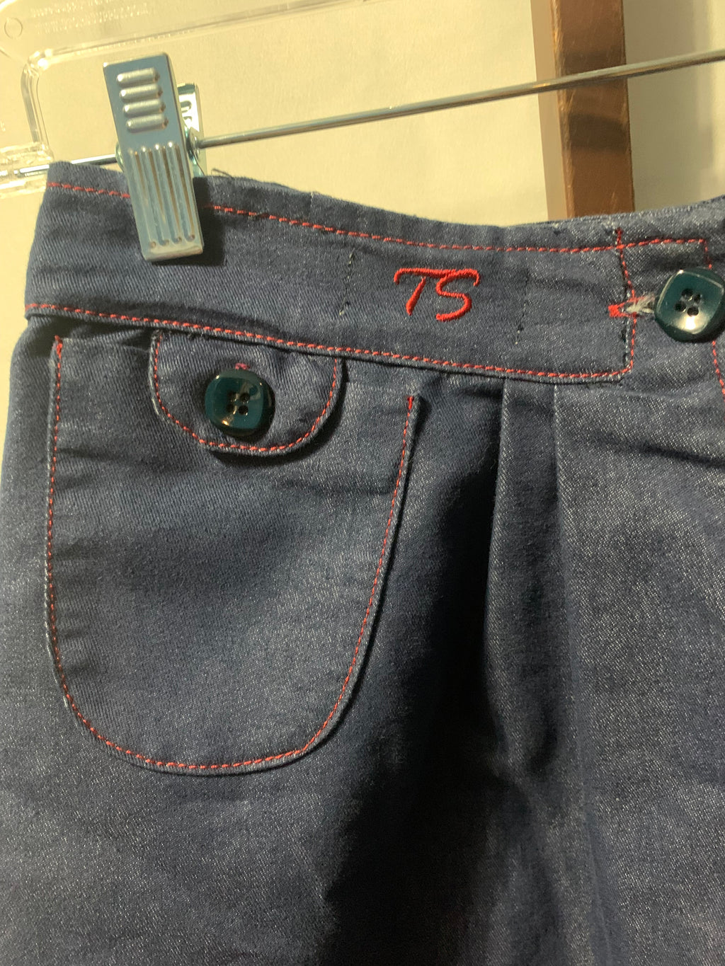 TShirterie navy blue cotton, polyester & tencel midi skirt with red stitching and button detail #midi #buttondetail