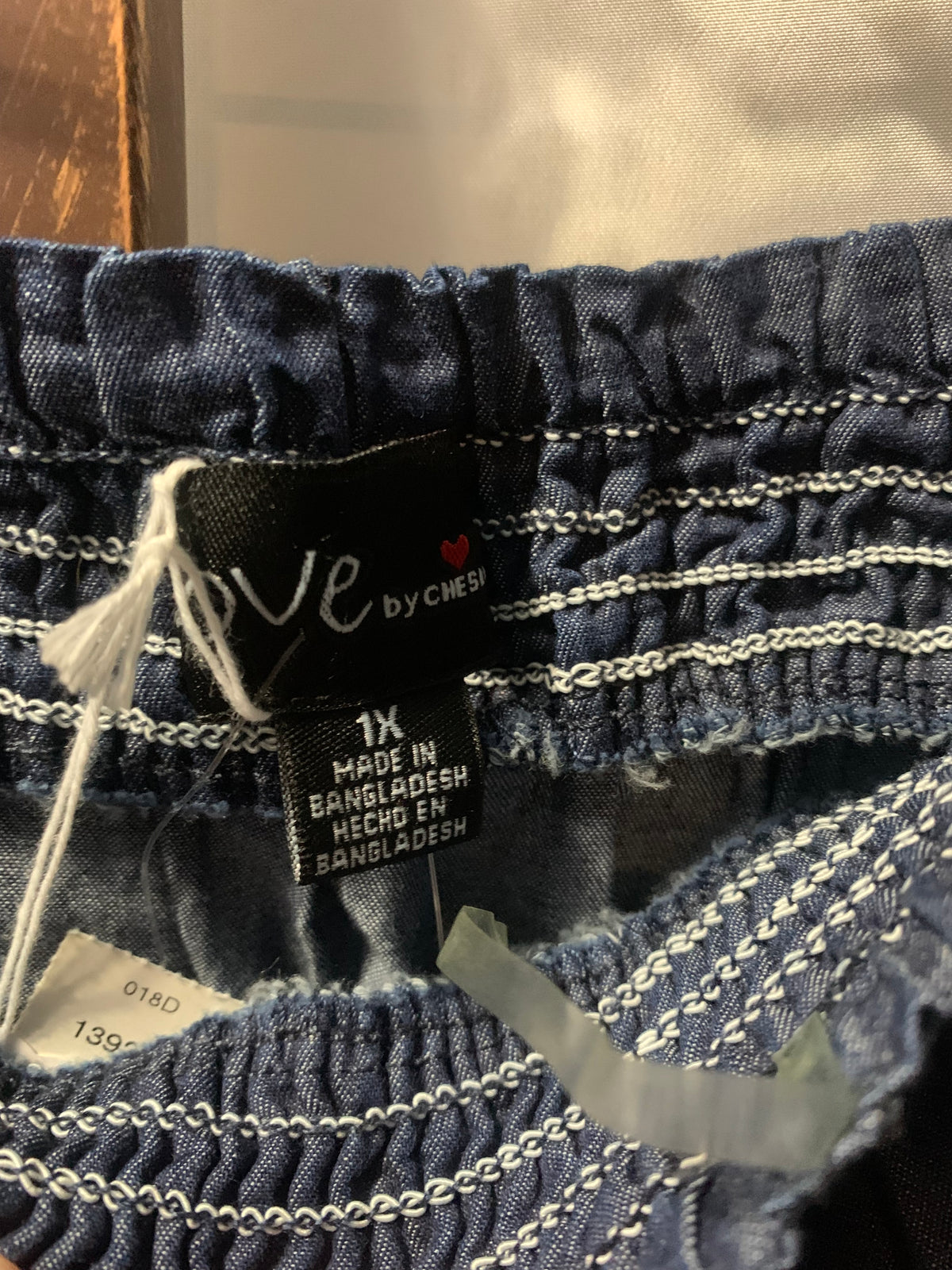 Love by Design/tagged as love by CHESLEY
Strapless Lightweight Denim / Chambray Jumpsuit  

 Size: Women's Plus Size 1x