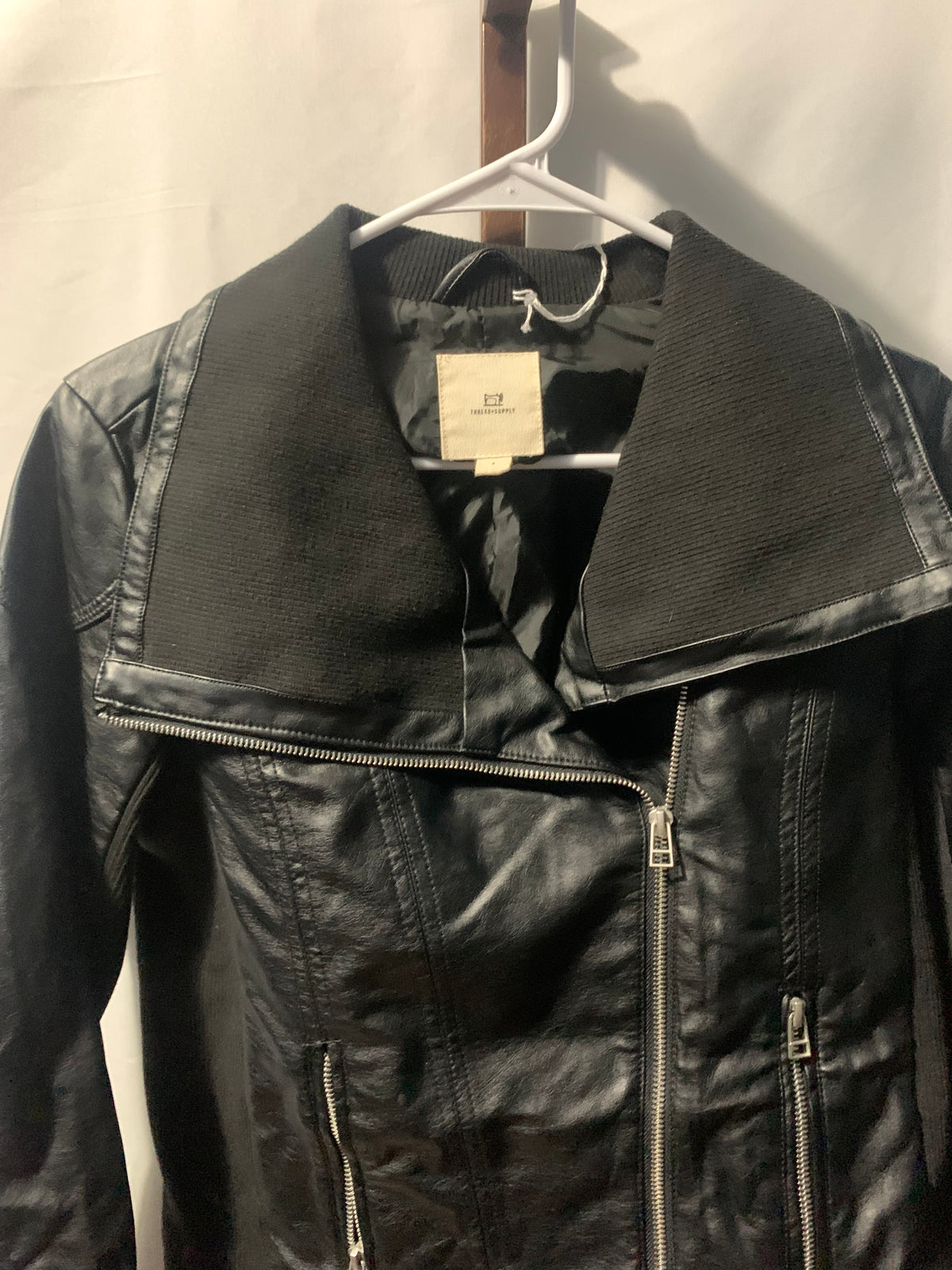 Black faux leather jacket with zipper details, size S #bikerchic #edgy