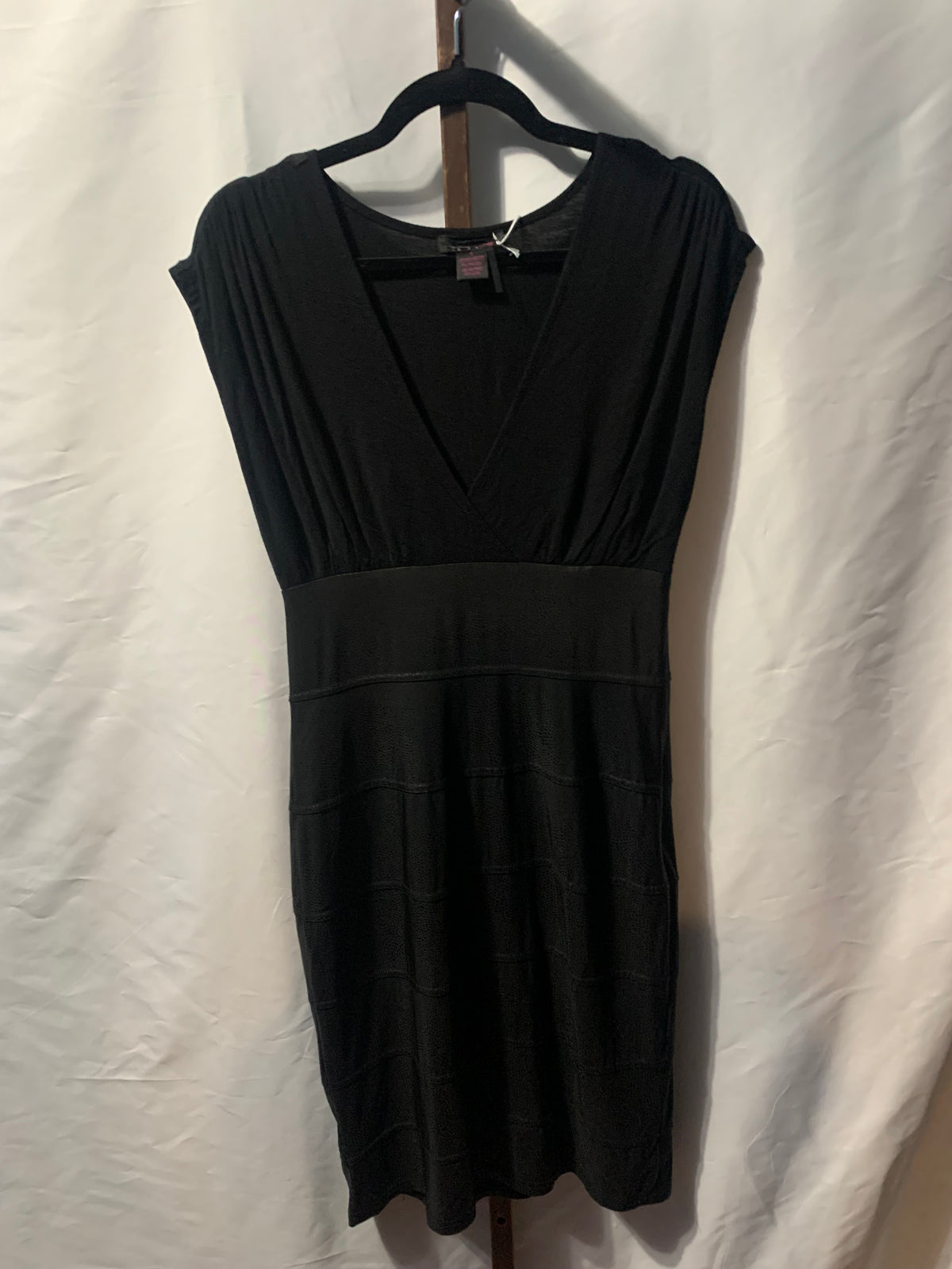 Black polyester & spandex mini dress with V-neckline and cap sleeves, size 8 #mini #vneck