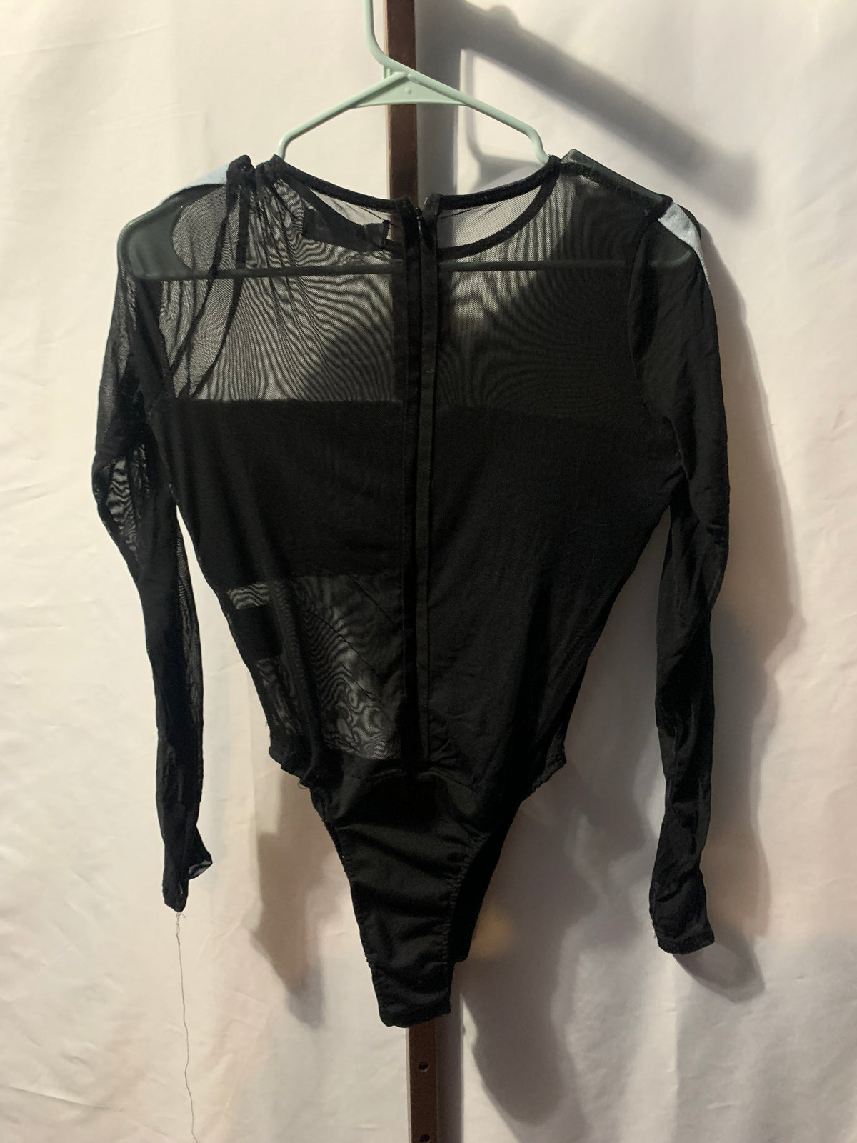 Black mesh bodysuit with blue denim panel #mesh #denim
