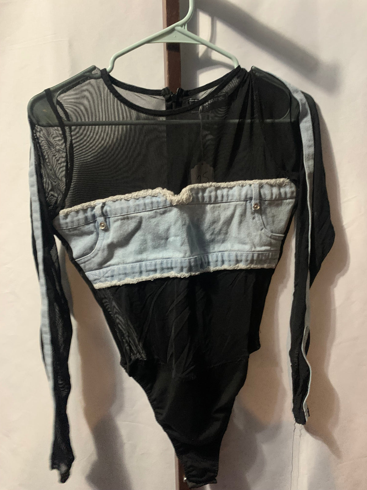 Black mesh bodysuit with blue denim panel #mesh #denim