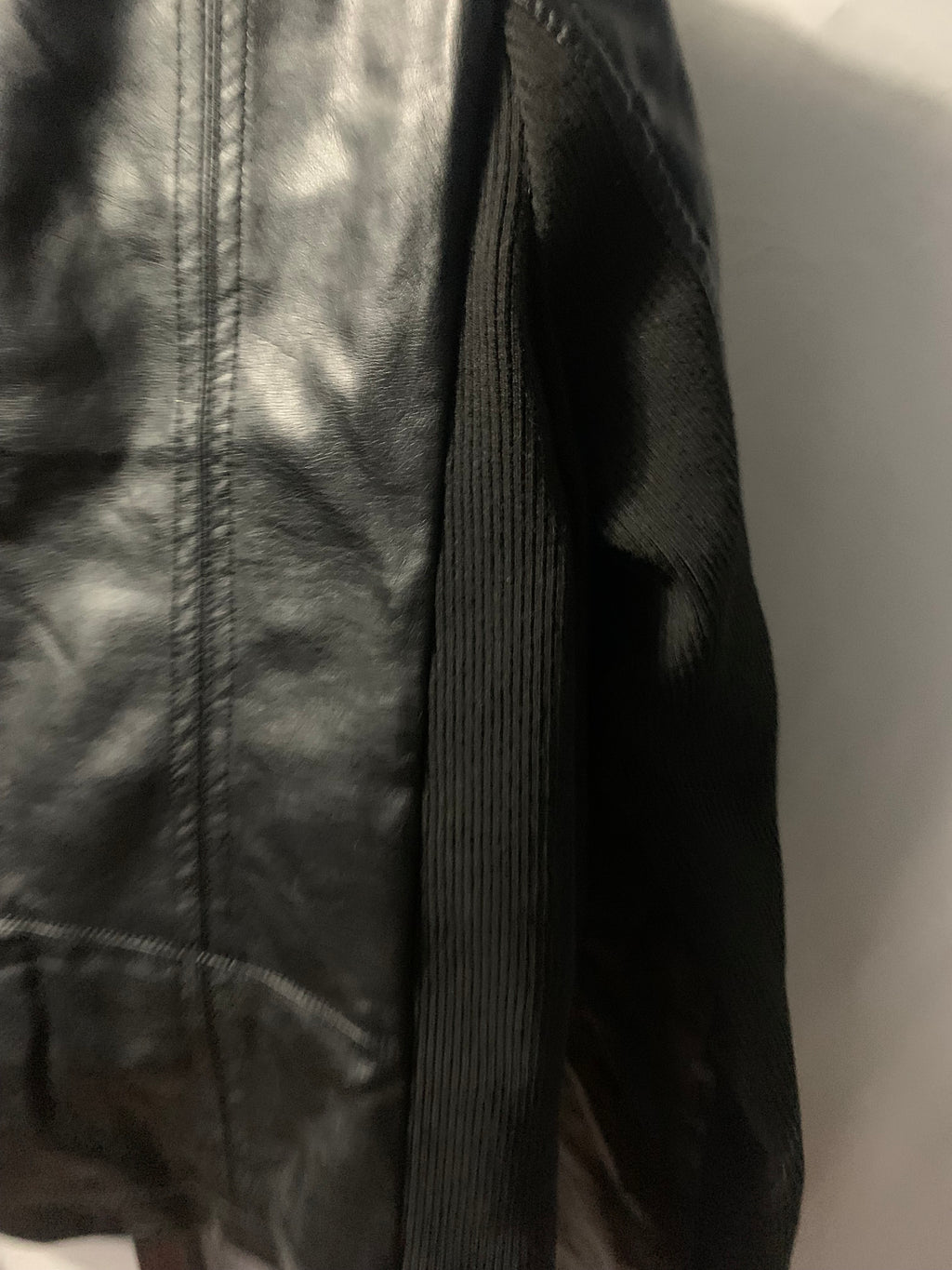 Black faux leather jacket with zipper details, size S #bikerchic #edgy