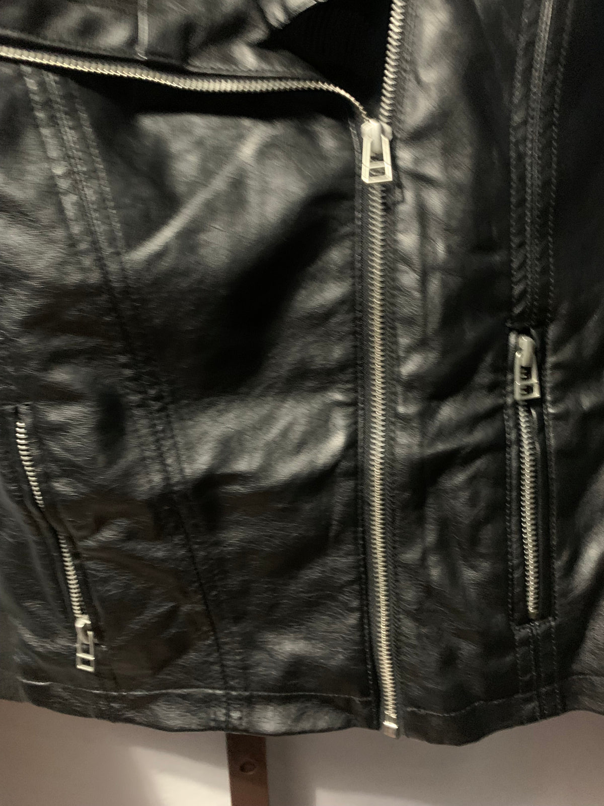 Black faux leather jacket with zipper details, size S #bikerchic #edgy